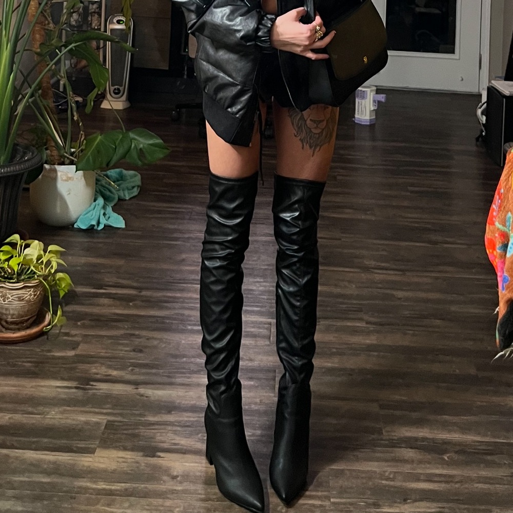 ASOS Black knee high Heeled Boots Sleek and Versatile